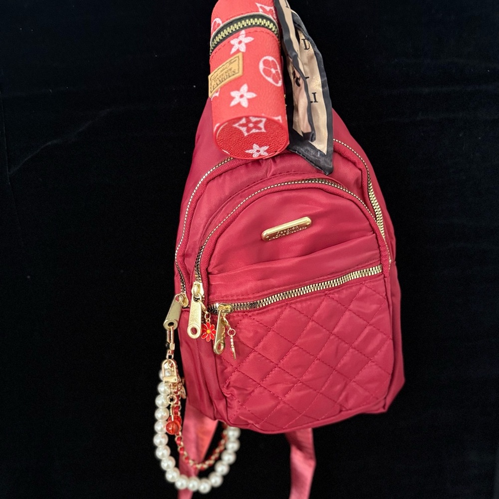Quilted Red Backpack with Gold Accents